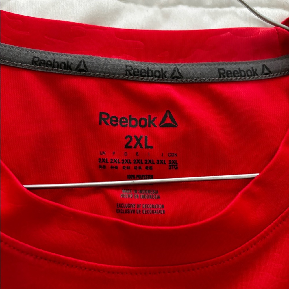 Men’s Reebok 2XL moisture wicking tshirt with hidden pocket on bottom (see pics)